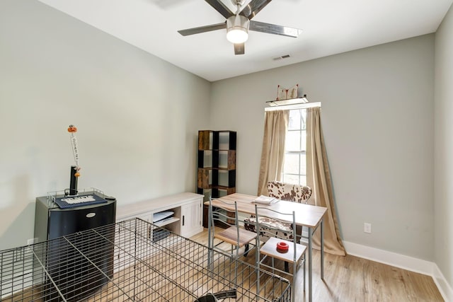 94 Hickory Ridge Ln, Woodbury, TN 37190 - home office with light wood finished floors and ceiling fan