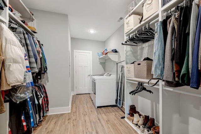 94 Hickory Ridge Ln, Woodbury, TN 37190 - laundry room featuring washing machine and clothes dryer and light wood-style flooring