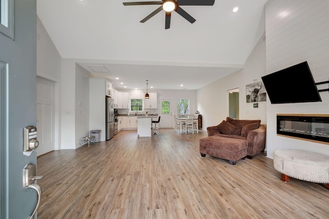 94 Hickory Ridge Ln, Woodbury, TN 37190 - living area with a ceiling fan, high vaulted ceiling, light wood-style floors, and recessed lighting