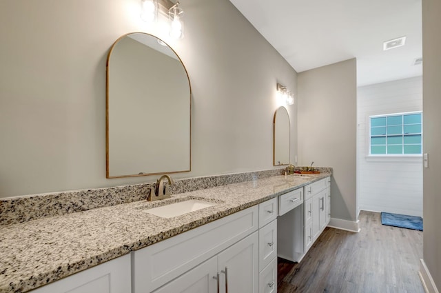 94 Hickory Ridge Ln, Woodbury, TN 37190 - bathroom with double vanity and wood finished floors