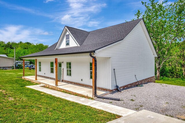 94 Hickory Ridge Ln, Woodbury, TN 37190 - view of side of home with roof with shingles and a lawn