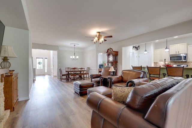 309 Patriotic Way, Mount Juliet, TN 37122 - living room with a ceiling fan, light wood-type flooring, and a chandelier