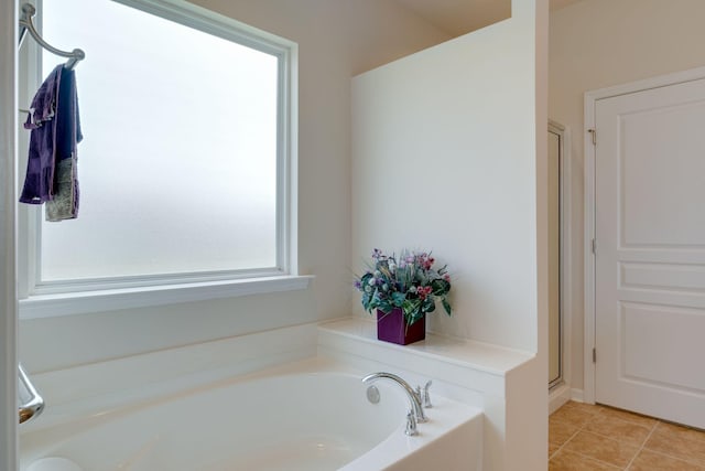 309 Patriotic Way, Mount Juliet, TN 37122 - bathroom featuring a bath, tile patterned floors, and a stall shower