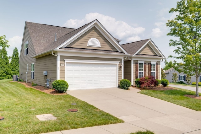 309 Patriotic Way, Mount Juliet, TN 37122 - view of front of home with a garage, roof with shingles, driveway, and a front lawn