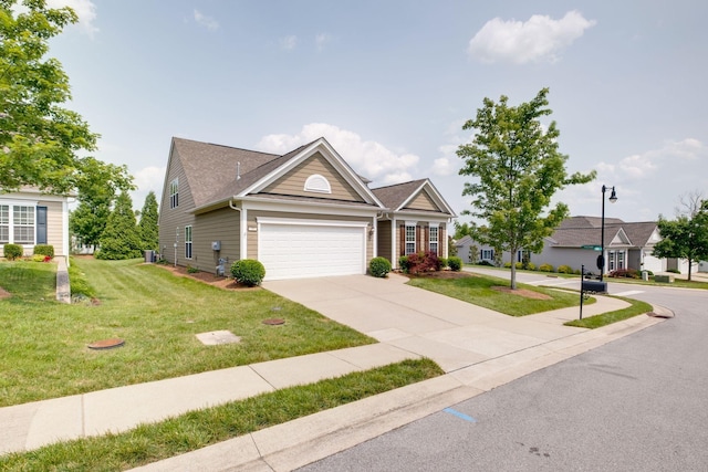 309 Patriotic Way, Mount Juliet, TN 37122 - view of front facade featuring an attached garage, a front lawn, and concrete driveway