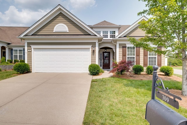 309 Patriotic Way, Mount Juliet, TN 37122 - view of front of property featuring concrete driveway, a front lawn, and an attached garage