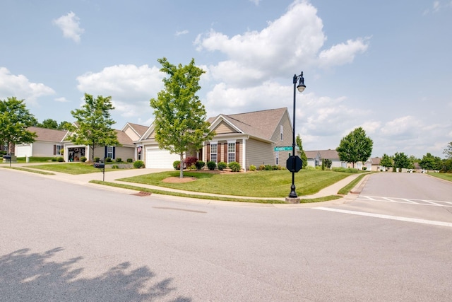 309 Patriotic Way, Mount Juliet, TN 37122 - view of front facade with concrete driveway, a garage, and a front yard