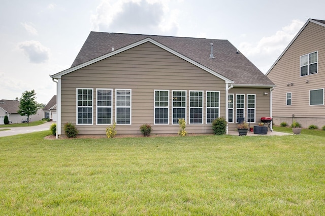 309 Patriotic Way, Mount Juliet, TN 37122 - back of property featuring a yard and a shingled roof