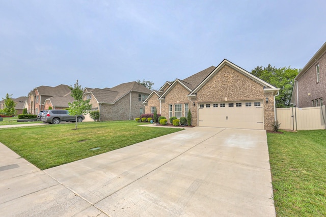 1655 Burrows Ave, Murfreesboro, TN 37129 - view of front of home with a garage, driveway, brick siding, a gate, and a residential view