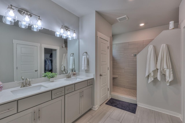 1655 Burrows Ave, Murfreesboro, TN 37129 - full bath featuring double vanity, a walk in shower, recessed lighting, and a walk in closet
