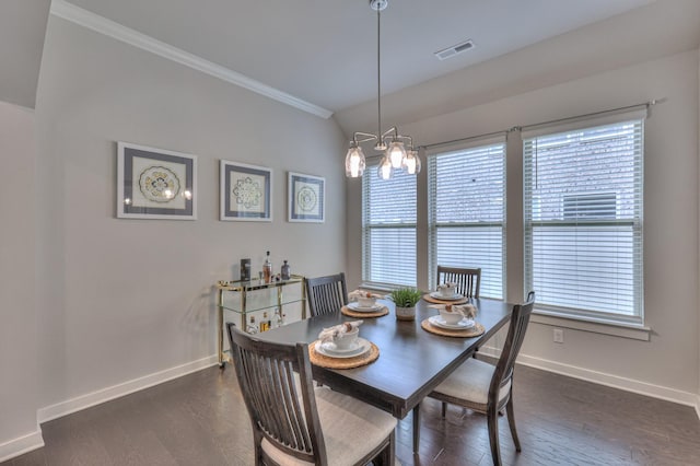 1655 Burrows Ave, Murfreesboro, TN 37129 - dining space featuring ornamental molding, healthy amount of natural light, a chandelier, and dark wood-type flooring