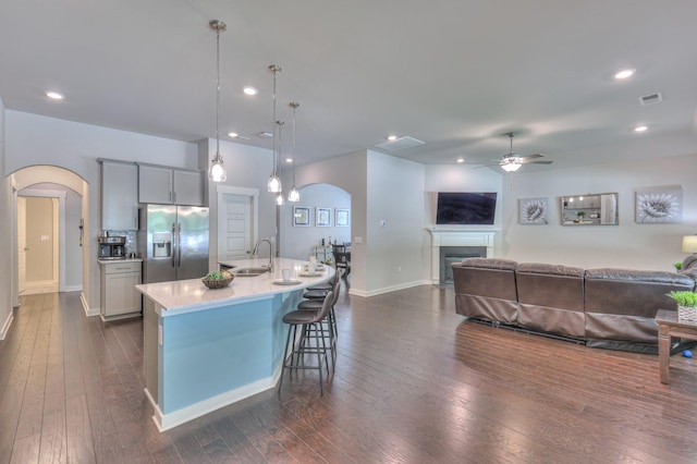 1655 Burrows Ave, Murfreesboro, TN 37129 - kitchen featuring stainless steel refrigerator with ice dispenser, arched walkways, open floor plan, a ceiling fan, and dark wood-style floors