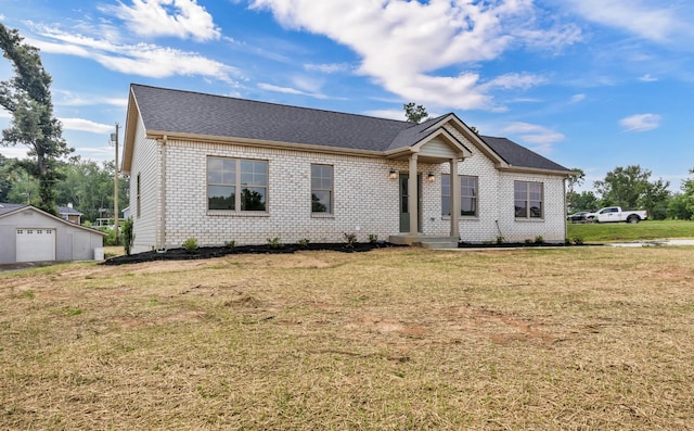 501 Eva Dr, Clarksville, TN 37042 - single story home featuring brick siding, a garage, a front lawn, and roof with shingles