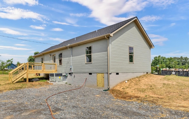 501 Eva Dr, Clarksville, TN 37042 - rear view of property featuring a wooden deck, a shingled roof, and crawl space