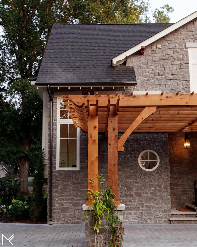 119 Winslow Rd, Franklin, TN 37064 - property entrance with stone siding and roof with shingles