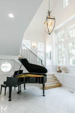 119 Winslow Rd, Franklin, TN 37064 - sitting room featuring a high ceiling, tile patterned flooring, and stairs