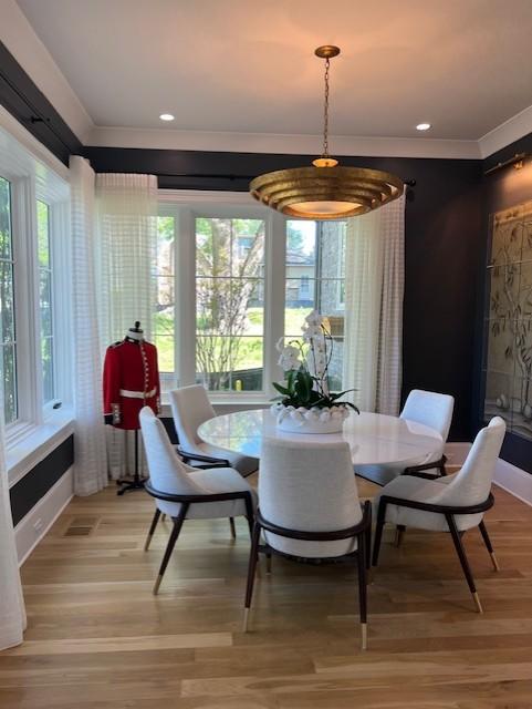 119 Winslow Rd, Franklin, TN 37064 - dining space with healthy amount of natural light, ornamental molding, light wood-type flooring, and recessed lighting