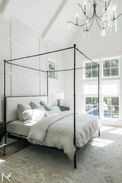119 Winslow Rd, Franklin, TN 37064 - bedroom featuring high vaulted ceiling, beam ceiling, and a chandelier