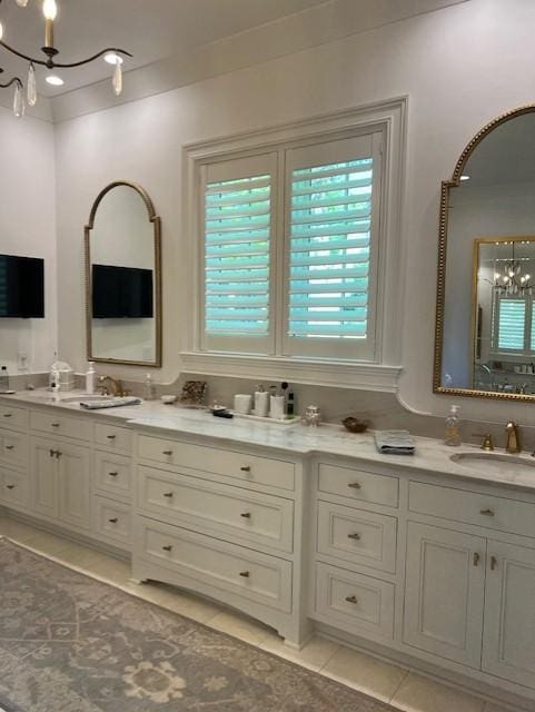 119 Winslow Rd, Franklin, TN 37064 - full bath with a chandelier, tile patterned floors, and double vanity