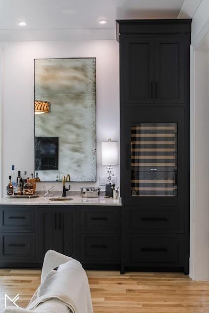 119 Winslow Rd, Franklin, TN 37064 - bar with light wood-style flooring, wine cooler, and recessed lighting