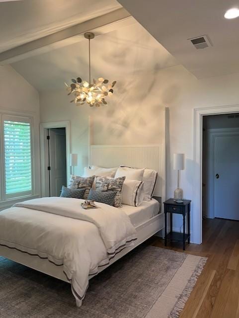 119 Winslow Rd, Franklin, TN 37064 - bedroom featuring dark wood-style floors and a chandelier