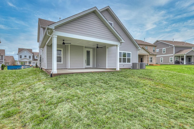 4013 Singing Creek Dr, Franklin, TN 37064 - back of property featuring ceiling fan, a yard, a patio, and a residential view