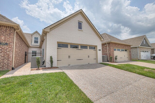9024 Headwaters Dr Unit 168, Franklin, TN 37064 - view of front of property with brick siding, driveway, and an attached garage