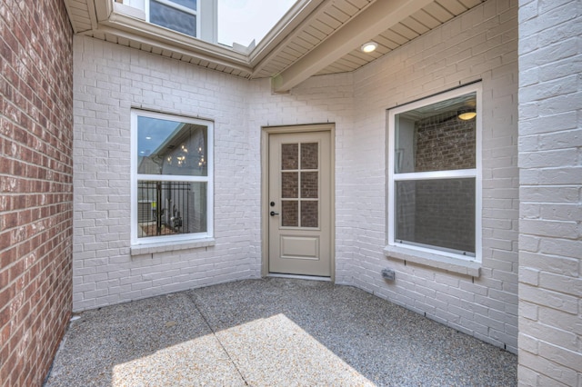 9024 Headwaters Dr Unit 168, Franklin, TN 37064 - view of exterior entry with a patio area and brick siding