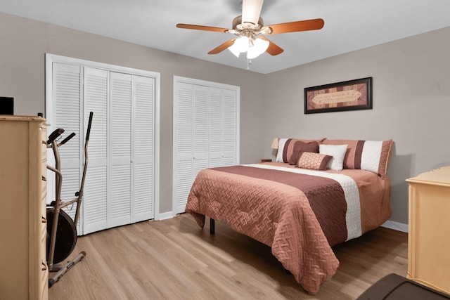 259 Mayflower Ln N, Madison, TN 37115 - bedroom featuring multiple closets, light wood finished floors, and ceiling fan