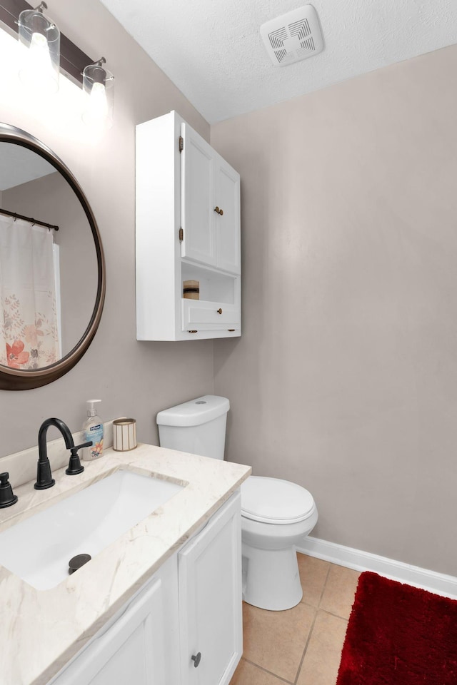 259 Mayflower Ln N, Madison, TN 37115 - full bath with vanity, tile patterned flooring, and a textured ceiling