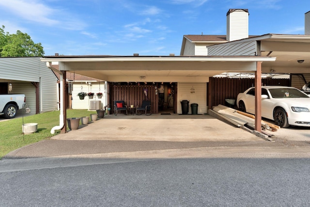 259 Mayflower Ln N, Madison, TN 37115 - view of parking / parking lot with an attached carport