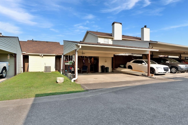 259 Mayflower Ln N, Madison, TN 37115 - view of front facade with a chimney, a front yard, and a shingled roof