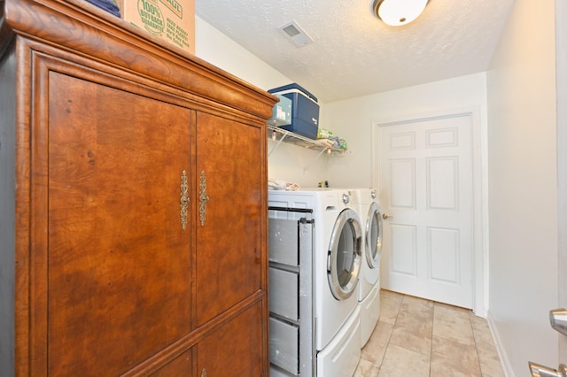 395 Devon Chase Hl Unit 3602, Gallatin, TN 37066 - laundry room featuring washer and dryer and a textured ceiling