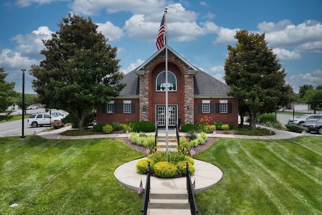 395 Devon Chase Hl Unit 3602, Gallatin, TN 37066 - view of front of house featuring french doors, a front yard, brick siding, and a shingled roof