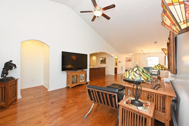 395 Devon Chase Hl Unit 3602, Gallatin, TN 37066 - living area with arched walkways, a ceiling fan, light wood-type flooring, and high vaulted ceiling