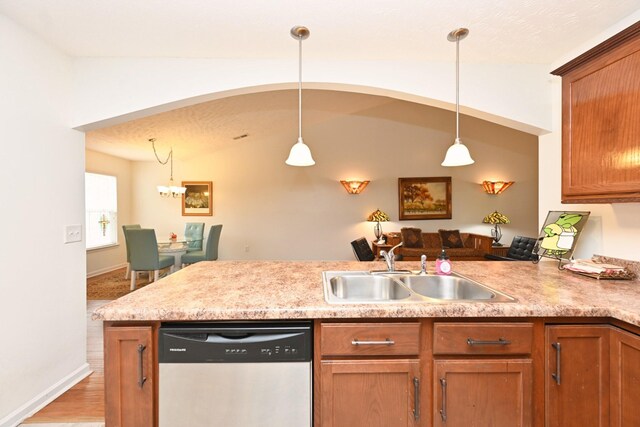 395 Devon Chase Hl Unit 3602, Gallatin, TN 37066 - kitchen with dishwasher, a peninsula, vaulted ceiling, light countertops, and pendant lighting