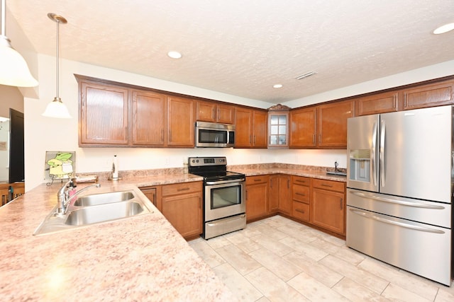 395 Devon Chase Hl Unit 3602, Gallatin, TN 37066 - kitchen with appliances with stainless steel finishes, light countertops, brown cabinets, recessed lighting, and glass insert cabinets