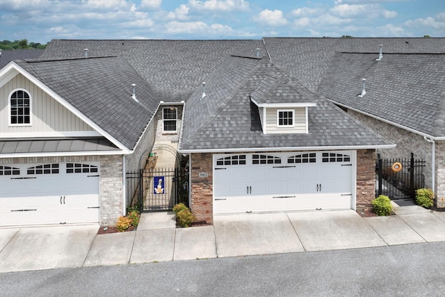 395 Devon Chase Hl Unit 3602, Gallatin, TN 37066 - view of front of home with a gate, concrete driveway, and roof with shingles