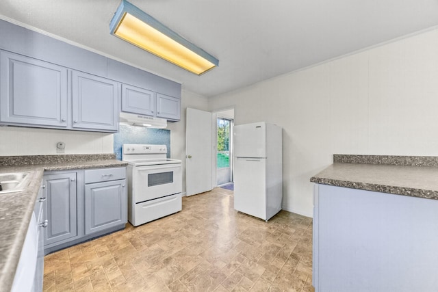 3892 Cedar St, Centerville, TN 37033 - kitchen with white appliances, under cabinet range hood, crown molding, and dark countertops