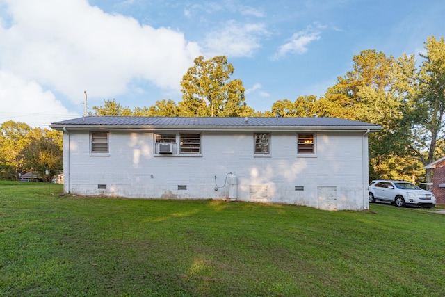 3892 Cedar St, Centerville, TN 37033 - rear view of house featuring crawl space, a yard, and a metal roof