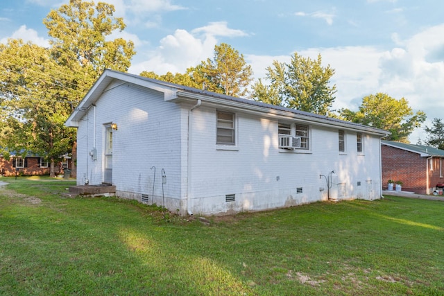 3892 Cedar St, Centerville, TN 37033 - view of side of home featuring crawl space, a lawn, and brick siding