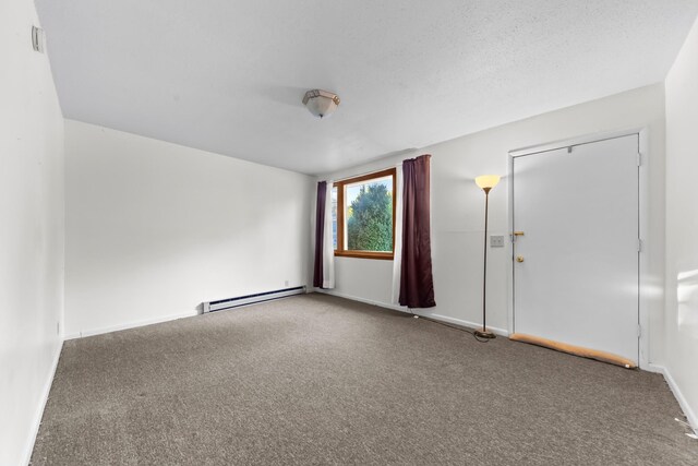 3892 Cedar St, Centerville, TN 37033 - empty room featuring a baseboard radiator and carpet floors