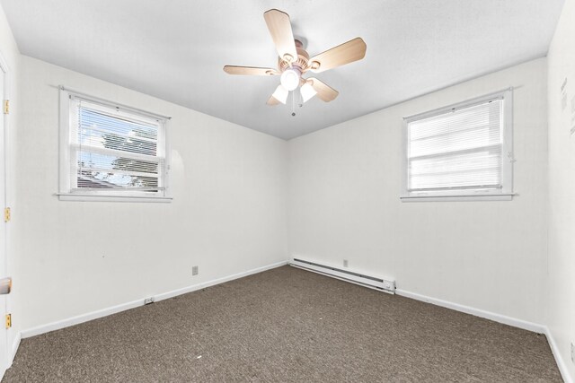 3892 Cedar St, Centerville, TN 37033 - carpeted empty room with baseboard heating, plenty of natural light, and a ceiling fan