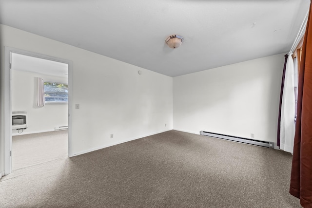 3892 Cedar St, Centerville, TN 37033 - empty room featuring a baseboard heating unit, carpet, and heating unit
