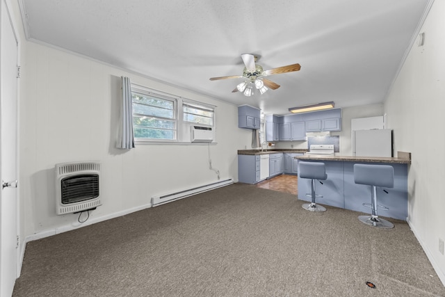 3892 Cedar St, Centerville, TN 37033 - kitchen featuring a baseboard heating unit, heating unit, white appliances, carpet flooring, and dark countertops