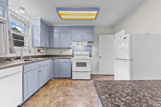 3892 Cedar St, Centerville, TN 37033 - kitchen with white appliances, under cabinet range hood, and stone finish flooring