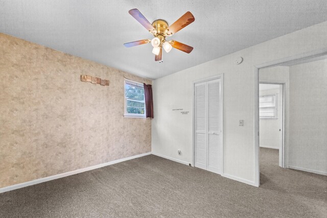 3892 Cedar St, Centerville, TN 37033 - unfurnished bedroom featuring carpet flooring, a closet, and a ceiling fan
