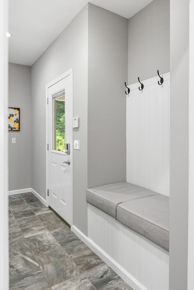1250 Ed Seay Gregory Ln, Hartsville, TN 37074 - mudroom featuring baseboards and stone finish flooring