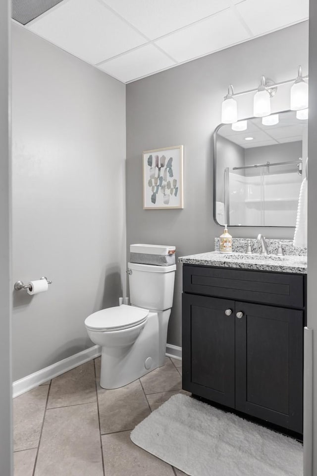 1250 Ed Seay Gregory Ln, Hartsville, TN 37074 - full bathroom featuring a shower, vanity, tile patterned floors, and a paneled ceiling