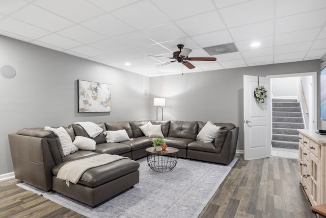 1250 Ed Seay Gregory Ln, Hartsville, TN 37074 - living area with dark wood-type flooring, a ceiling fan, stairs, a drop ceiling, and recessed lighting